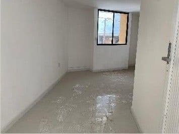 Casa con local comercial, cortina de acero, una recamara y 1.5 baños 10