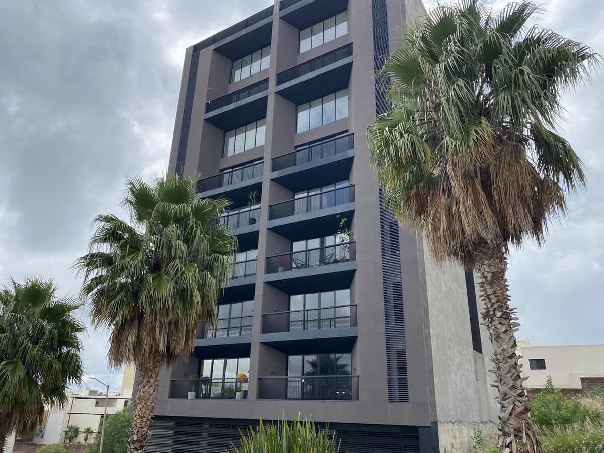 Magnífico PH de dos plantas y roof top en exclusiva torre de departamentos 2